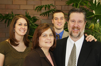 Roger Parlour pictured with his wife - Kama, daughter - Brittany and his son - Joel.