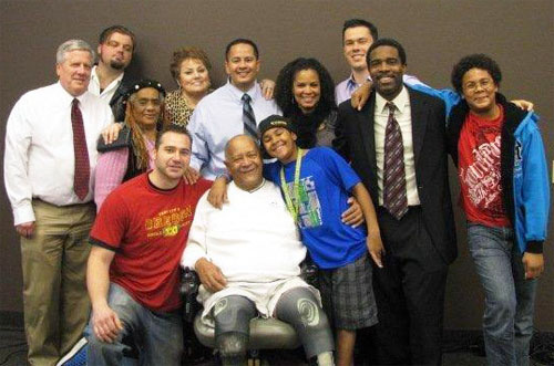 So excited and happy after his baptism, Ron Harding Sr. is with his son Ron, his
extended physical family, and the brothers that studied with him!